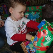 Evan opening gifts