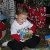 Evan opening gifts