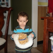 Evan and the fake cat (pre-firehouse fun)