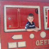 Evan in the firetruck