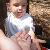 Mommy holding the worm for Evan