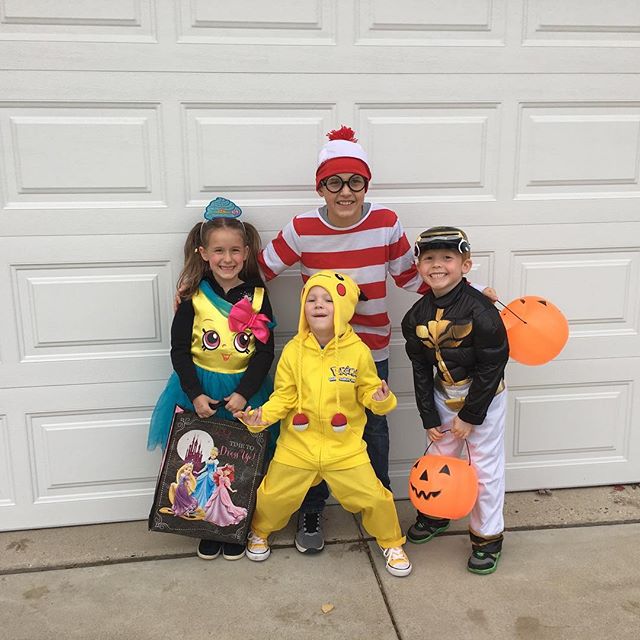 The kids with their Pikachu friend Nick (yellow)