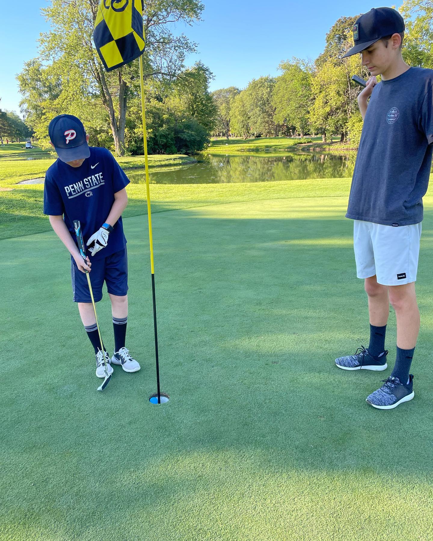 Evening golf with these two. My winning days may be numbered.