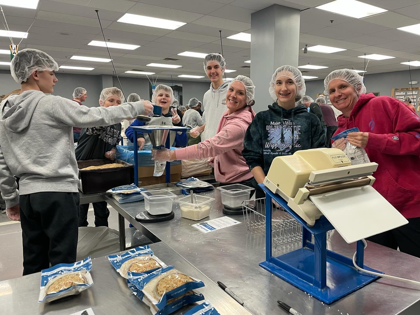 Another great experience with friends volunteering at Feed My Starving Children